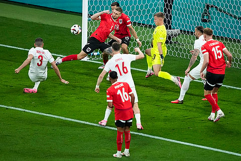 Turkey's Merih Demiral scores the opening goal 